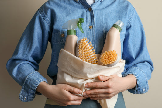 woman using eco-friendly cleaning hacks with her eco-friendly cleaning products